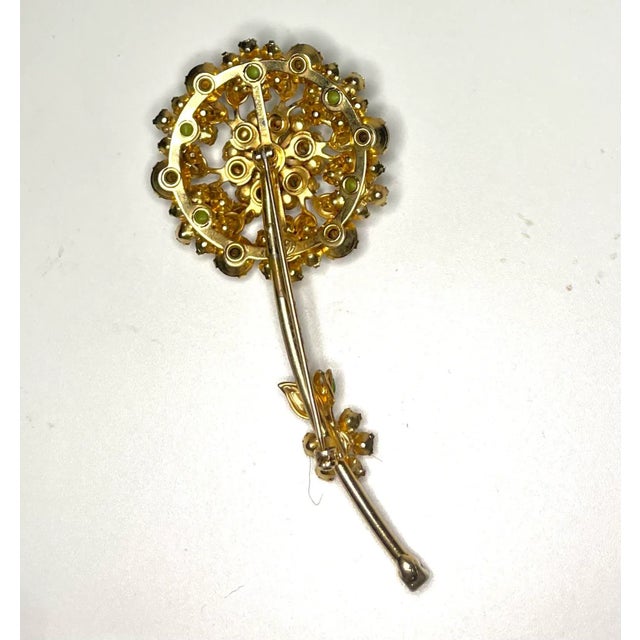 This is part of Chairish’s Costume Jewelry assortment. Flower Brooche from the 1940s w Yellow and Green Glass beads and...