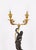 This is a very fine antique pair of French bronze and ormolu figural candelabra, circa 1820 in date. This finely cast pair...