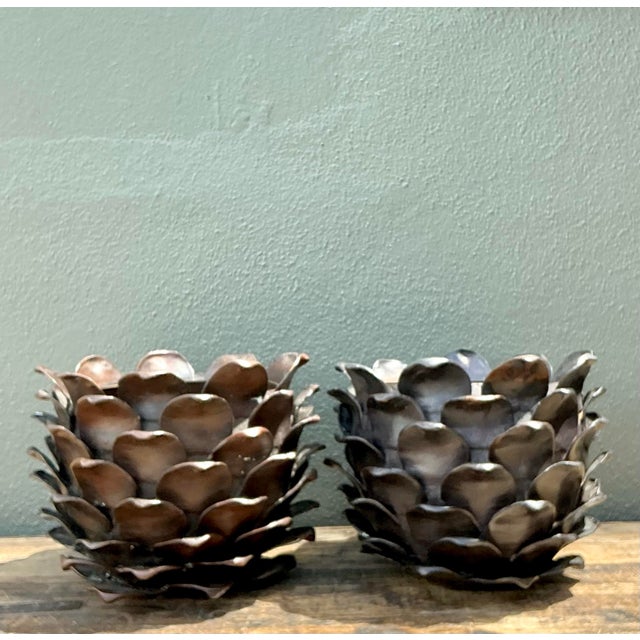 Elevate your interior with this exceptional pair of vintage patinated bronze "Bread Apple" sculptures by the celebrated...