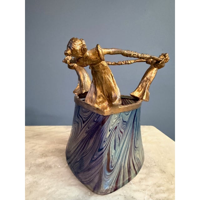 An exceptional Art Nouveau vase by Loetz, dating to circa 1895, exemplifying the firm’s early mastery of iridescent art...