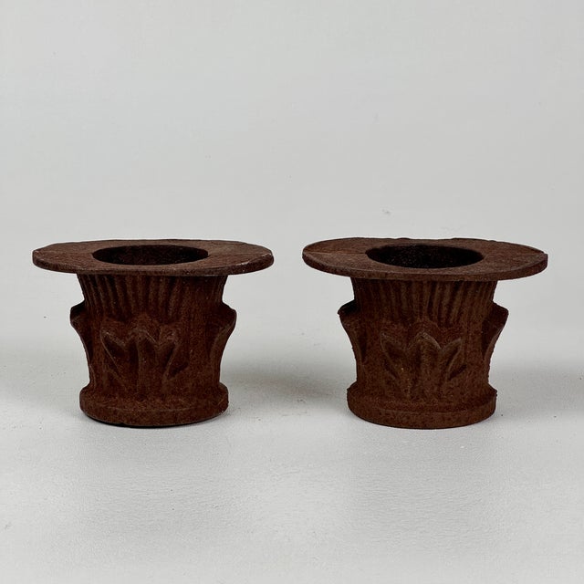 We're not 100 sure what these are. We're actually not sure what they are at all. We are guess these pair of cast metal,...