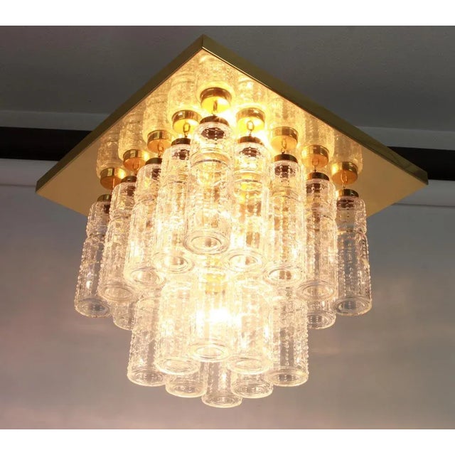 Rare two-tier flush mount or chandelier with hand blown glass pieces on a brass base made by glashütte limburg. Heavy...