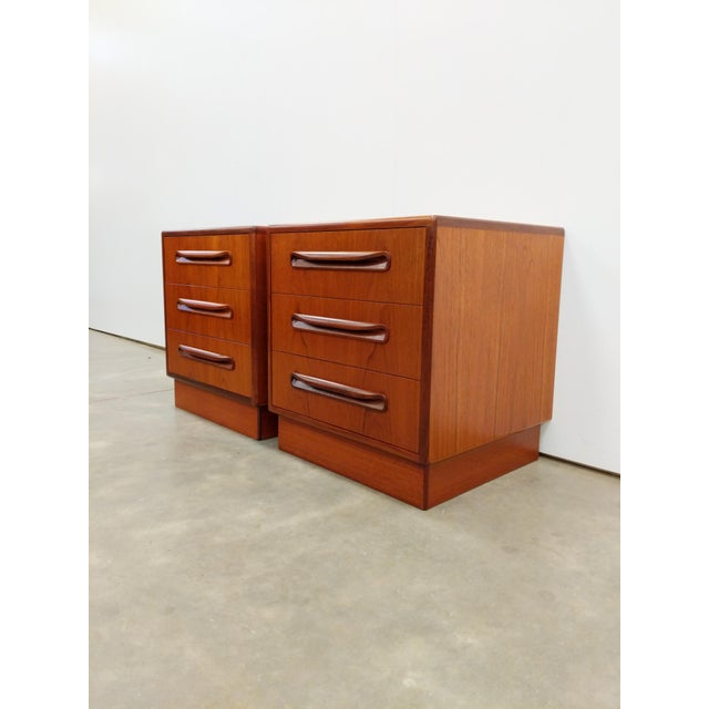 Pair of authentic vintage mid century modern teak nightstands / chests of drawers. "Fresco" series designed by Victor B...