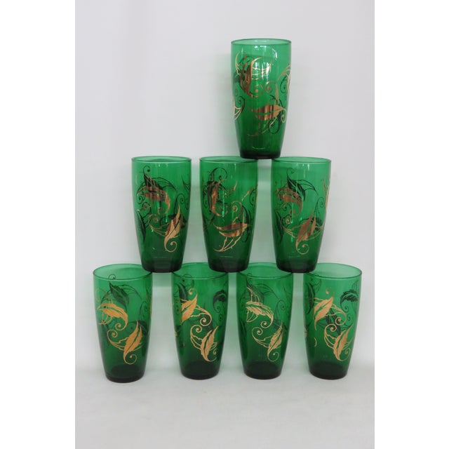 This beautiful Set of 8 Cups is made of glass. We believe they made by Anchor Hocking due to their design, however they...