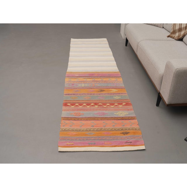 Vintage Hand-Knotted area rug is a semi-antique vintage area rug. The '70s Eastern region of Anatolia's unique rug is...