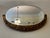 The Art Deco wall mirror is attached to the wall using two eye screws or a cord. It consists of a gold-colored wooden...