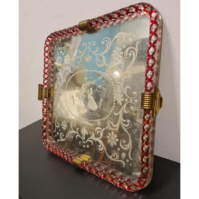 Mirrored tray by Ercole Barovier Refined tray from the 1950s with engraved mirror top. Submerged glass rope edging and...