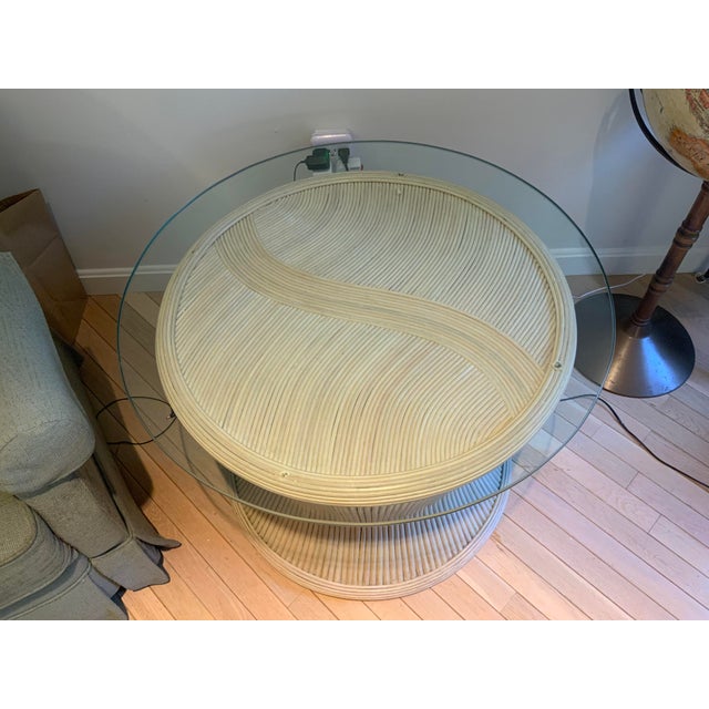 20th century bamboo and glass side table. In the manner of Ficks Reed, no marks or labels.