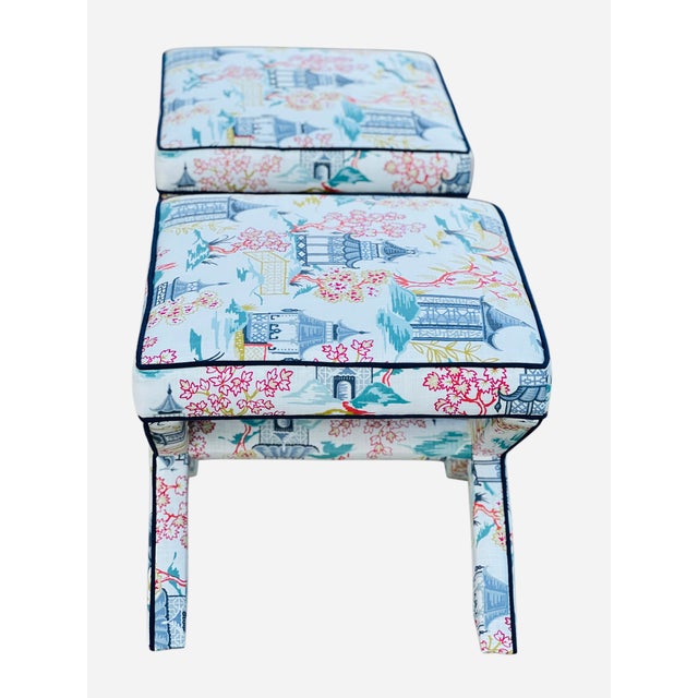 Pair of Whimsical X Benches in a large scale Chinoiserie print featuring punchy pagodas and showy landscapes on a crisp...