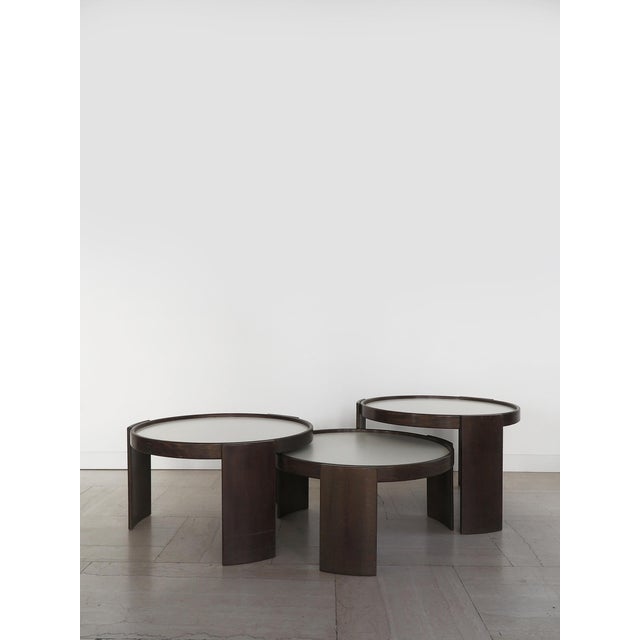 Set of three modular and stackable coffee tables, model "780," designed by gianfranco frattini and produced by cassina...