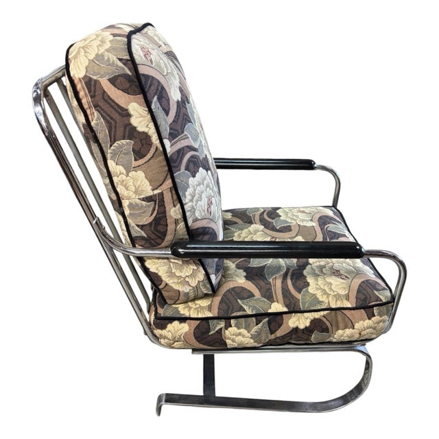 The product is a vintage 1940 Art Deco chrome rocker with replacement cushions in excellent condition. This American-made...