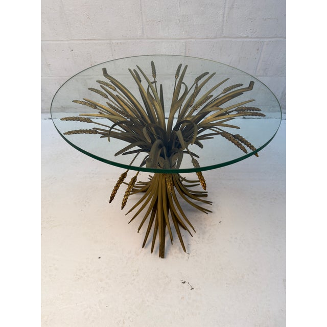 Vintage mid-20th-century gilt metal sheaf of wheat side table, designed in the Hollywood Regency style. Formed from...