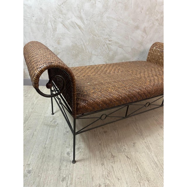Charming bench in woven rattan and wrought iron, combining the natural warmth of rattan with the graphic elegance of a...