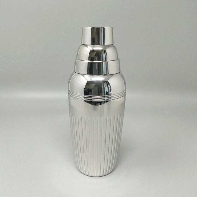 1930s a stunning example of ;art deco barware, this silver-plated cocktail shaker is part of the prestigious jordan...