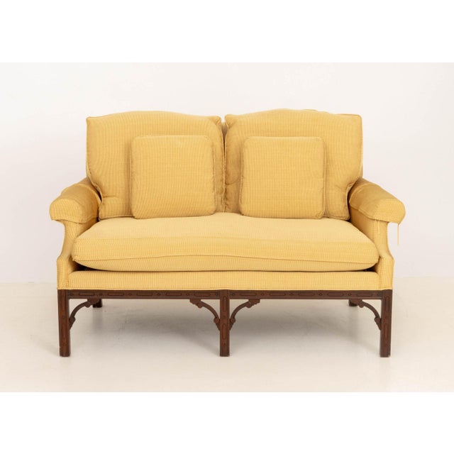 Southwood Chinese Chippendale Style Yellow Fabric Upholstered Mahogany Sofa, label beneath cushion. 38" H x 59" W x 32" D;...
