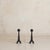 A pair of French wrought-iron andirons from the 1930s, well-scaled with a grounded presence. Each is formed with a...