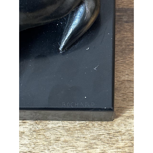 Superb Art Deco sculpture of a reclining doe, in patinated bronze, signed Irénée Rochard, resting on an elegant black...