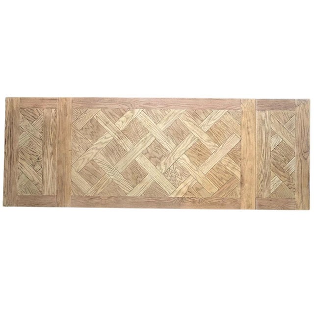 Gorgeous vintage parquet oak dining table. We love the pattern details and the base is stunning. This piece comes with two...