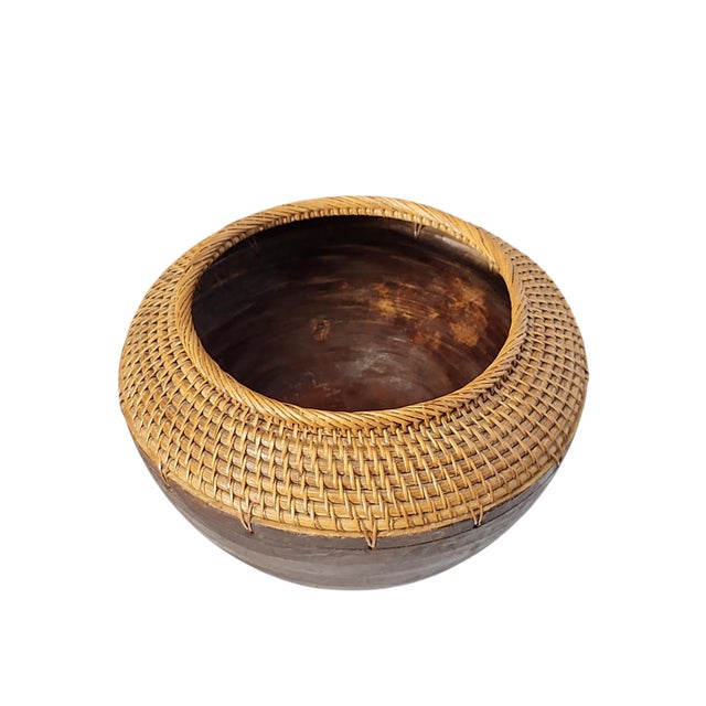 Beautiful large 19th century wooden basket with woven rattan top, of likely Asian origin, possibly Indonesian, in...