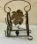French iron wine bottle rack for 3 bottles decorated with grapes circa 1950.