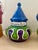 1970s Alvino Bagni for Raymor ceramic canister set featuring bold hand-painted designs and vibrant colors. Often referred...