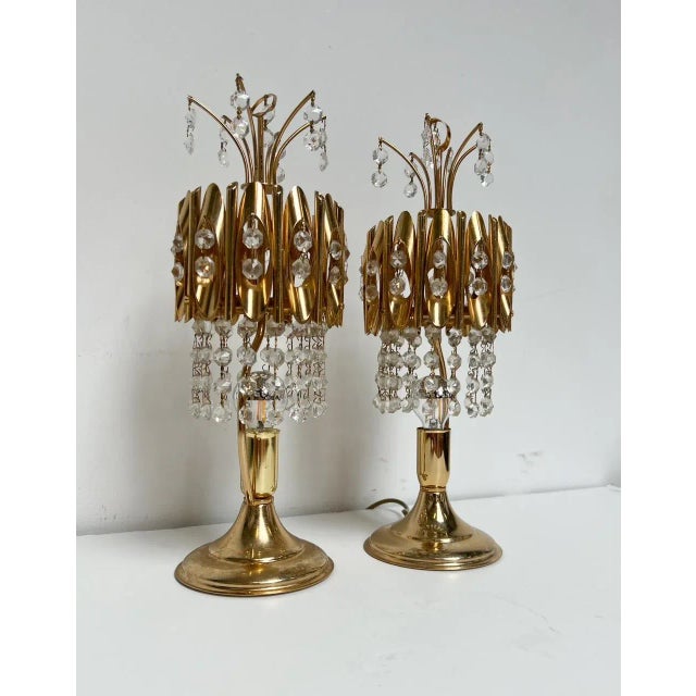 So glamorous, these brass-colored table lamps! The lamps are 40 cm high and very decorative with their glass stones. Bring...