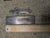 Vintage 12-piece furniture hardware set featuring six rectangular drawer backplates and six ornate escutcheon-style pull...