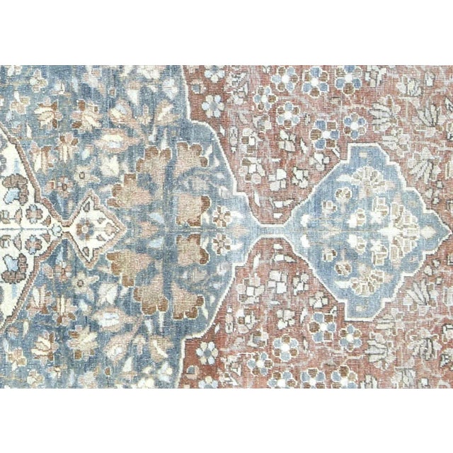 1940s Persian Tabriz Rug. Hand woven in the Tabriz region of Northern Iran. Distressed and refinished in the U.S. The...