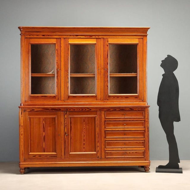 Double-body sideboard in larch, crafted in Italy at the end of the 19th century, featuring a solid structure and refined...