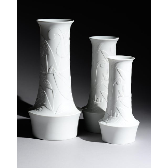 Floral relief bisque porcelain vase trio – cuno fischer for hutschenreuther selb, 1960s an elegant trio of white bisque...