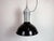 Industrial black enamel factory pendant light made by philips in netherlands during the 1960s. White enamel inside the...