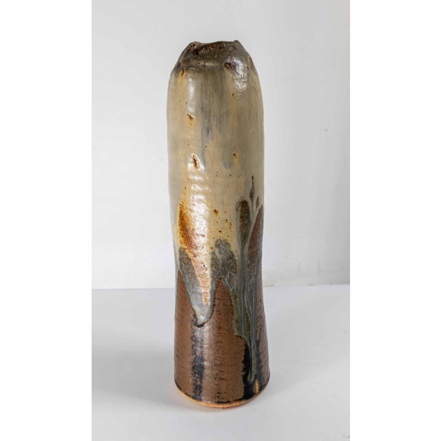 We are selling this nice Mid-Century Studio Art Pottery Vase. This piece has multi color glaze inspired by Japanese...