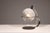 Discover the elegance of mid-century design with this exquisite Italian table lamp, crafted from chrome with a hand-blown...