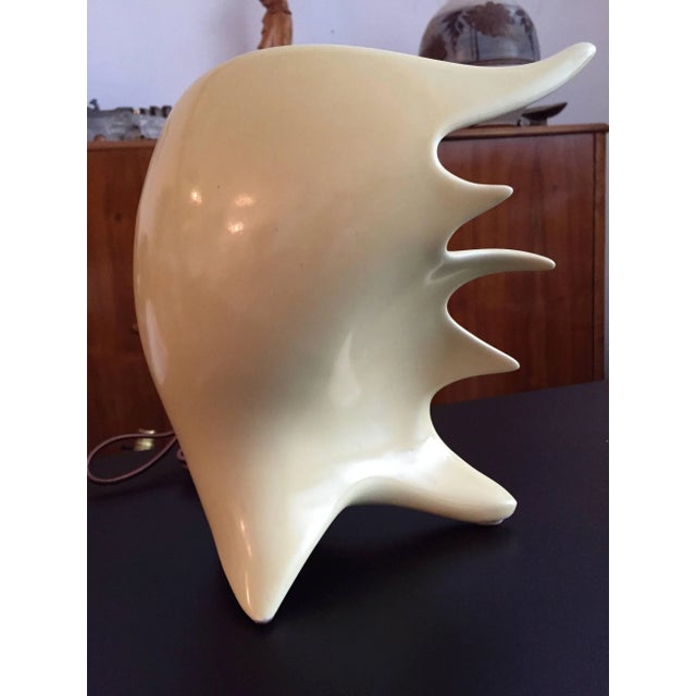 An original 1950s Conchiglia glazed ceramic lamp in the form of a conch shell. Societa Ceramica Italiana di Laveno. Signed.