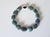 Discover an extraordinary vintage statement necklace featuring exceptionally large natural Arizona Chrysocolla beads....