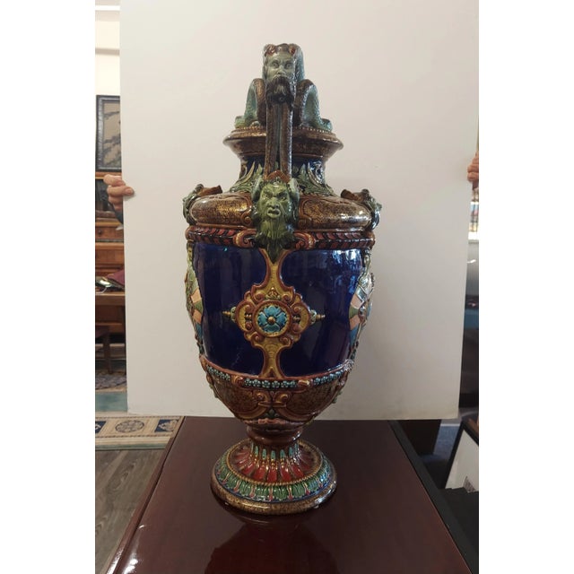 Antique unsigned Italian Majolica vase is in great, antique condition. It does has a few chips to the body, which is...