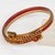 French Celluloid Bracelet Geometric Bypass Bangle with Orange and Red Crystal For Sale - Image 4 of 6
