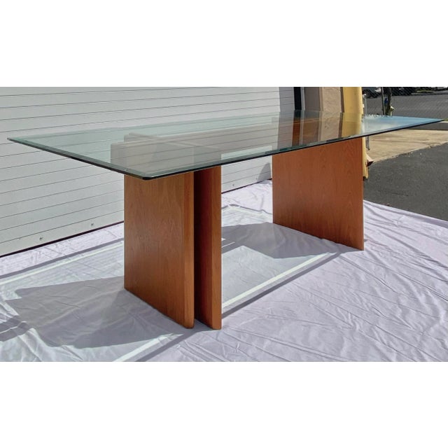Mid-century teak modern modular dining table. Made in Denmark by Trekanten. A classic dining piece with a stunning Danish...