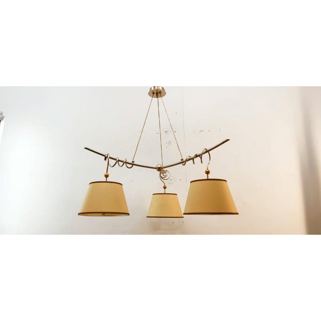 Metal and Parchment Suspension Light, in Very Good conditions. Designed 1980 to 1989 Up to 250V (Europe/UK Standard).The...