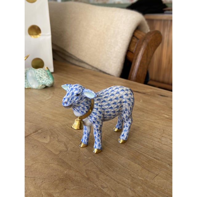 An innocent young lamb trots freely with a sonorous bell resounding round his neatly-sheared neck. Handmade and...