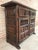 About From Northern Spain, constructed of solid walnut, the rectangular top with molded edge atop a conforming case...