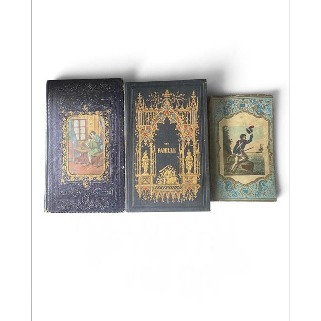 A captivating trio of authentic mid-19th-century French "Cartonnages Romantiques" (romantic publisher's bindings), dating...