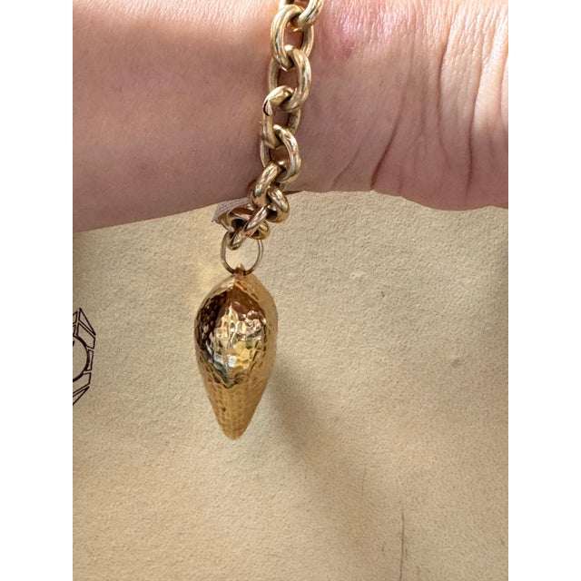 Solid 14 karat gold Vintage 14 Karat Yellow Gold 24.3 Gm Link Bracelet for Charms with Huge Heart Charm 14 Karat Yellow...