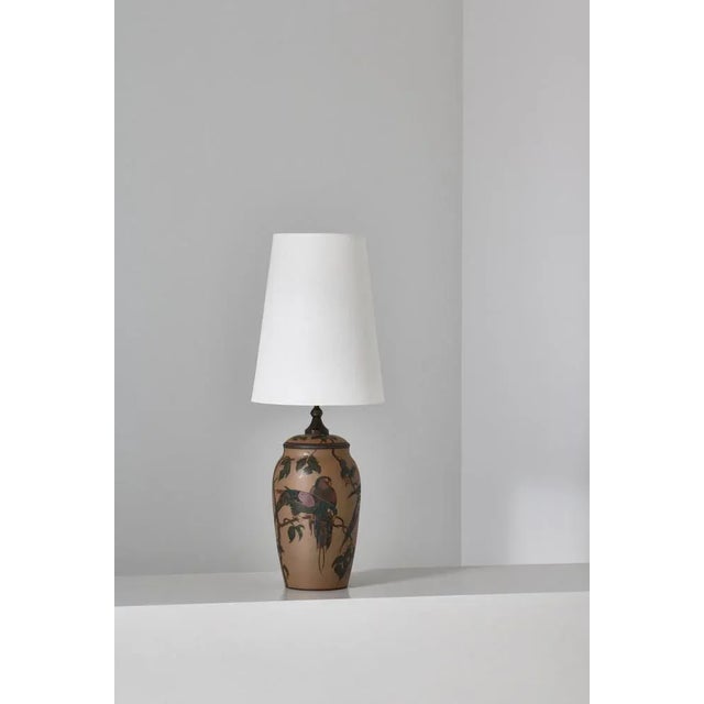 Ceramics table lamp made at "l. Hjort", denmark in the 1930s. The base is made from stoneware and hand decorated with...