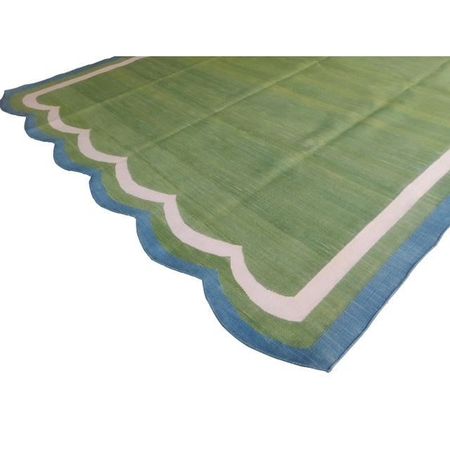 Cotton Scalloped Edge Reversible Rug. Scalloping runs along 8' sides. These special flat-weave dhurries are hand-woven...