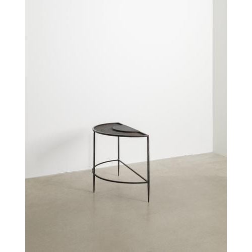 A rare and decorative french mid century side console table in black lacquered metal by mathieu matégot produced by...