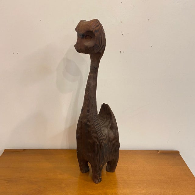 This large carved wood tiki cat is by Witco. It is missing its eyes but still looks great.