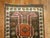 Mid 20th century tribal Turkish Anatolian runner with a tribal design in brown, orange, pink and ivory dominant accents...