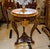 Elevate your space with this elegant French Empire Side Table, featuring a luxurious marble top, graceful curved legs, and...