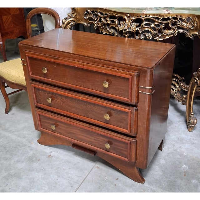 Art Deco Chest of Drawers in Mahogany and Stained Wood This elegant Art Deco chest of drawers, crafted from mahogany and...